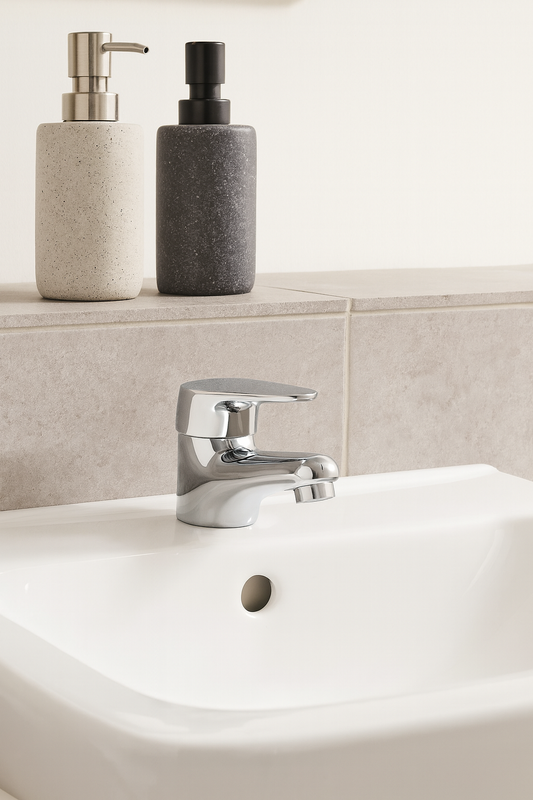 Deva Adore ADORE313C chrome basin mixer tap installed on modern ceramic washbasin