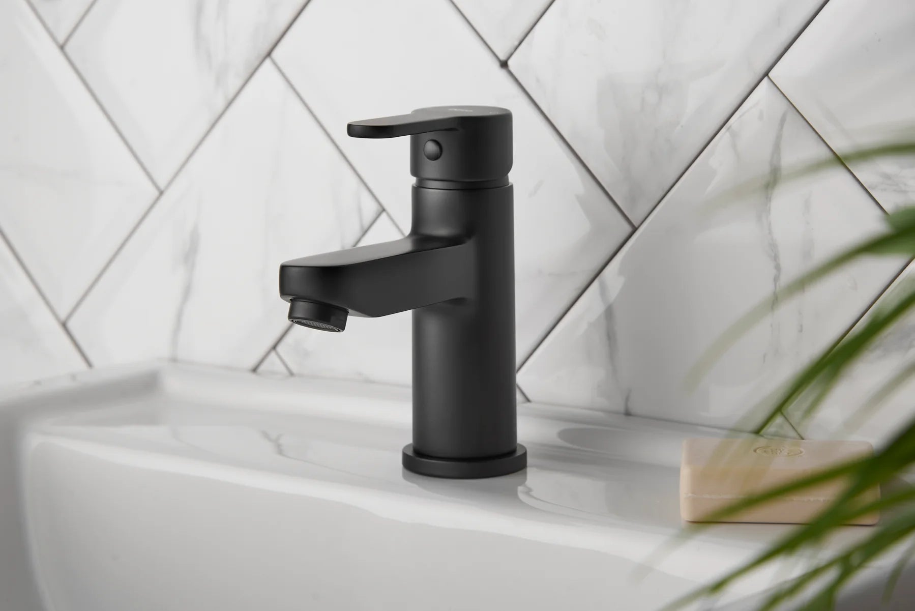 Deva Ethos matt black basin tap installed on bathroom sink with matching waste at IrishBath
