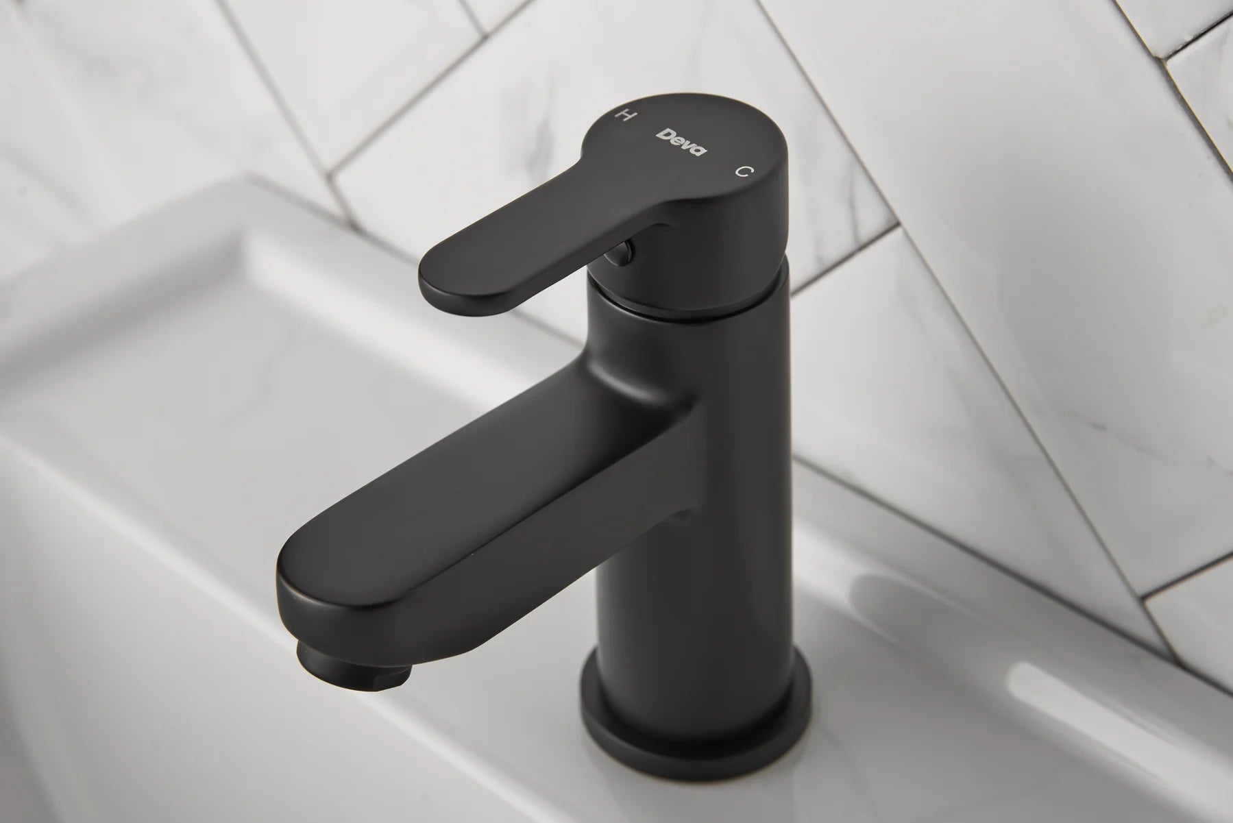 Close-up matt black basin mixer tap single lever handle – Deva Ethos ETH313 and ETH113BK