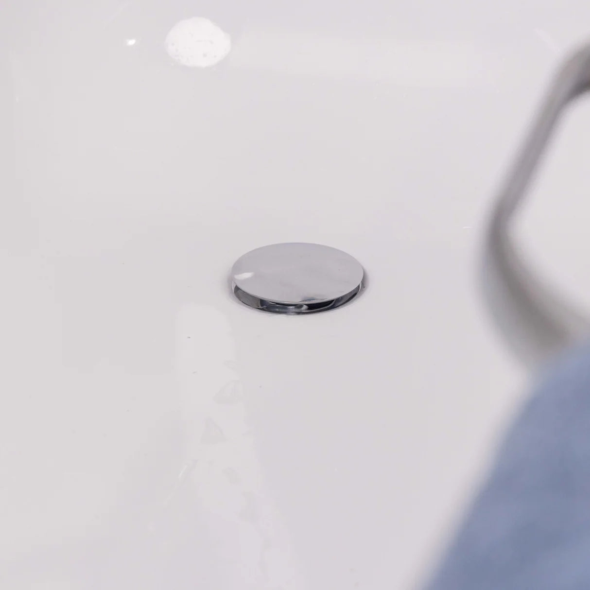 Chrome removable dome and strainer basket detail of Ellsi at Irishbath