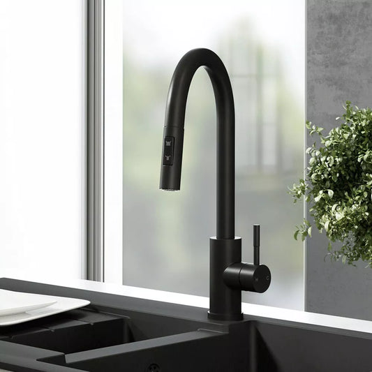 Ellsi black mat kitchen faucet with pull-out and spray installed on a black sink view