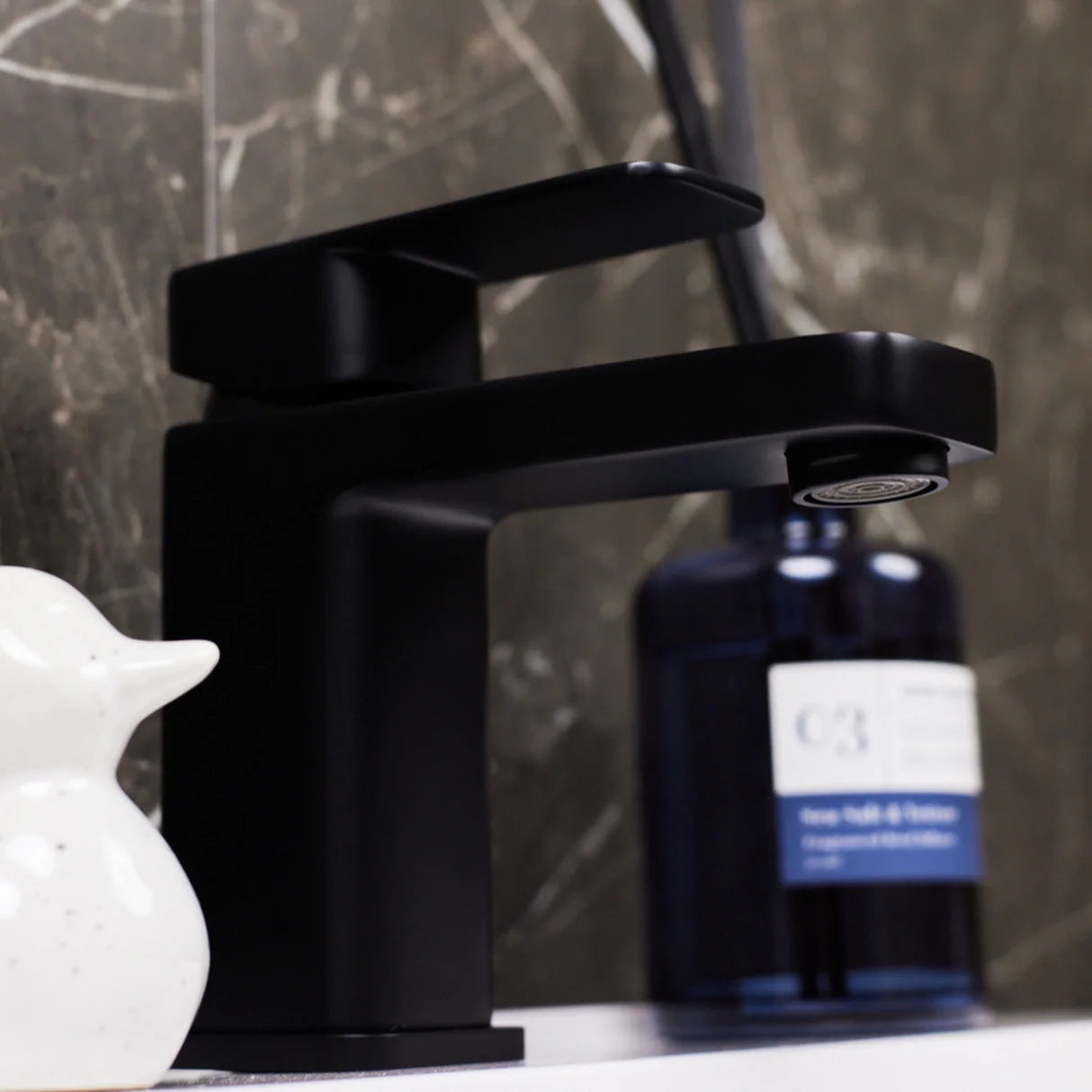 Modern matt black basin mixer tap with single lever