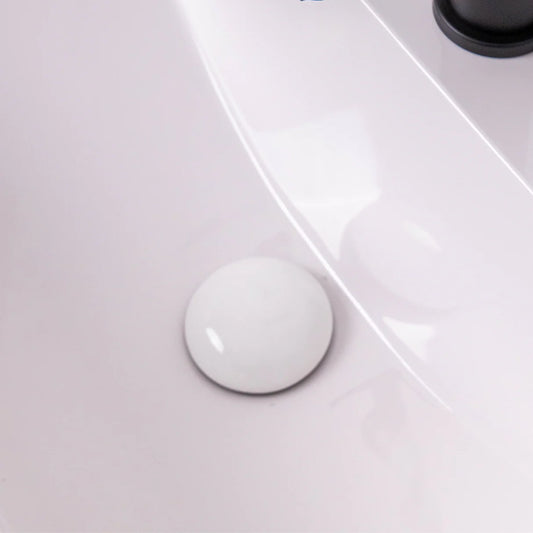 G1 ¼″ White ceramic click-clack basin waste installed in ceramic basin