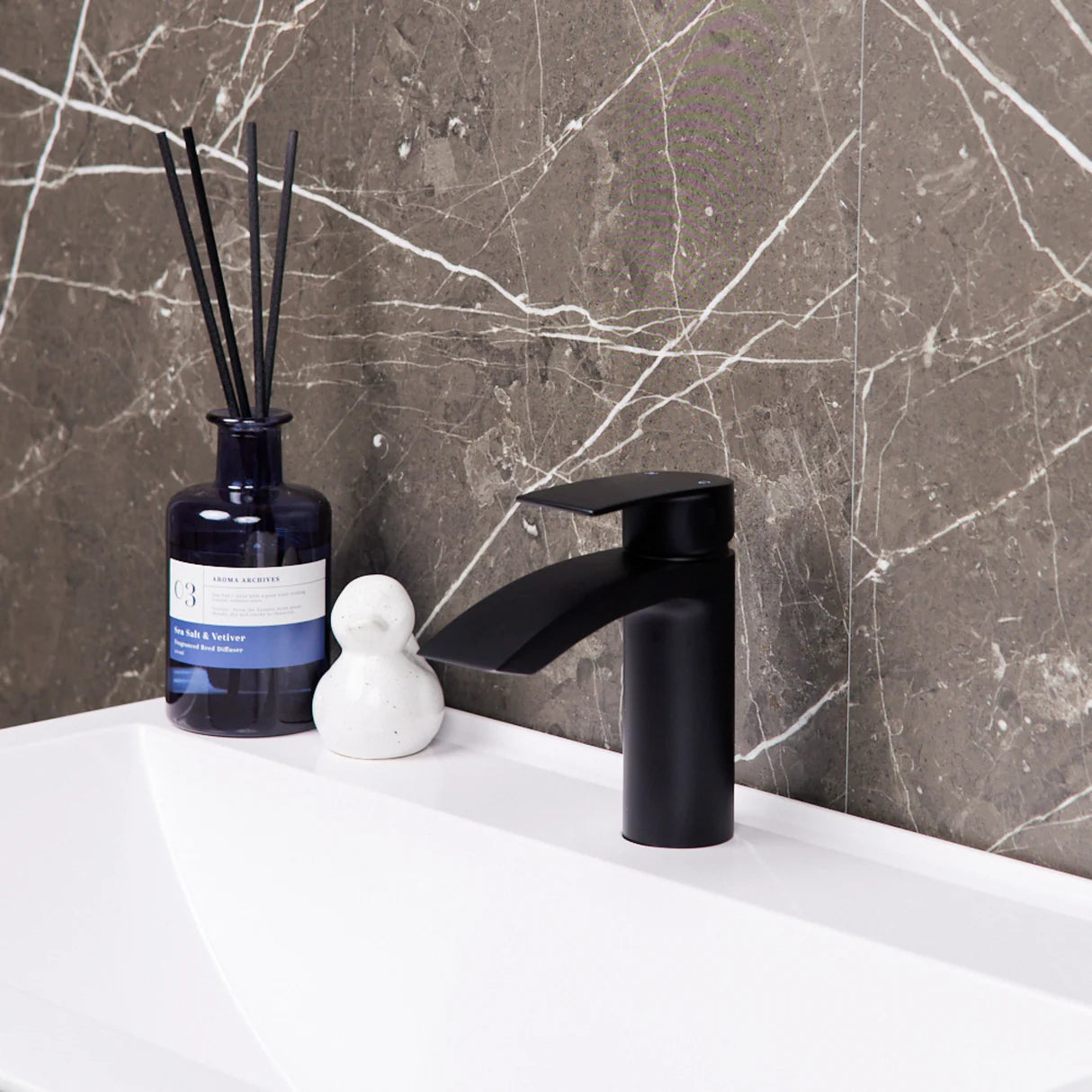 Matt black Ellsi ETAL Spear mono waterfall basin mixer tap on basin