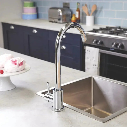 Chrome Tivoli Kitchen mixer sink tap installed side view on a modern kitchen.