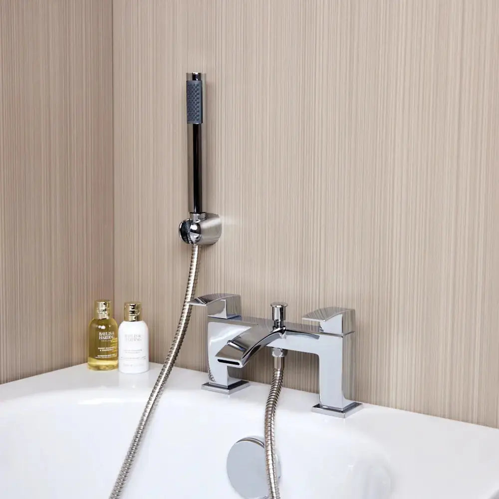 Chrome bath mixer tap with shower hose - side view