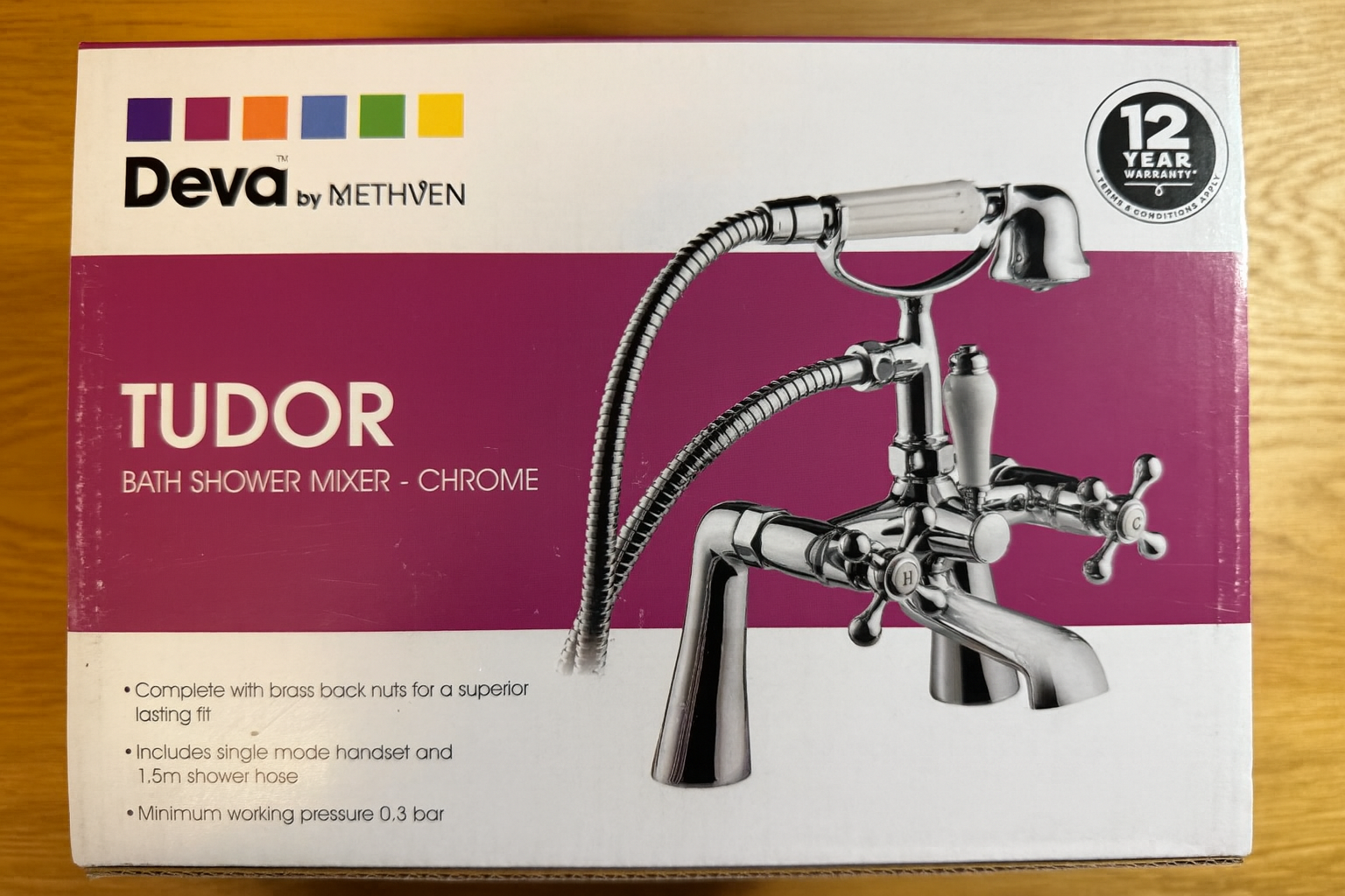 Deva Tudor Traditional Bath filler and Shower Mixer in Chrome in original packaging boxed on the wooden surface at IrishBath.ie