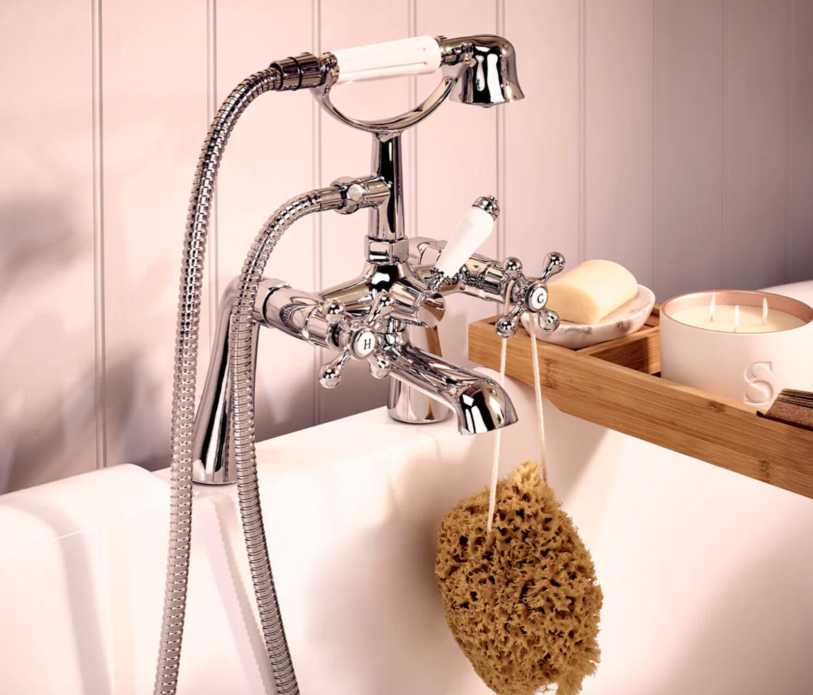 Round body chrome Victorian bath shower mixer installed on bathtub at IRISHBATH store