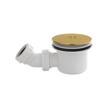 Kartell 90mm fast flow shower waste with a bright gold brass cover on a white trap body with an angled side outlet