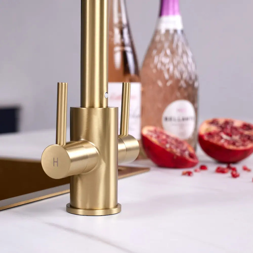Close-up of the hot lever and solid brass body of the Adria brushed brass kitchen tap