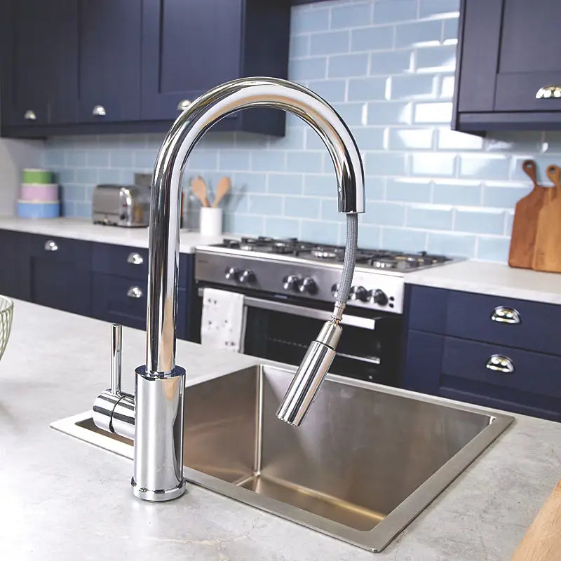 Close-up of CATO chrome pull-out spray head with dual spray function installed in IrishBath kitchen