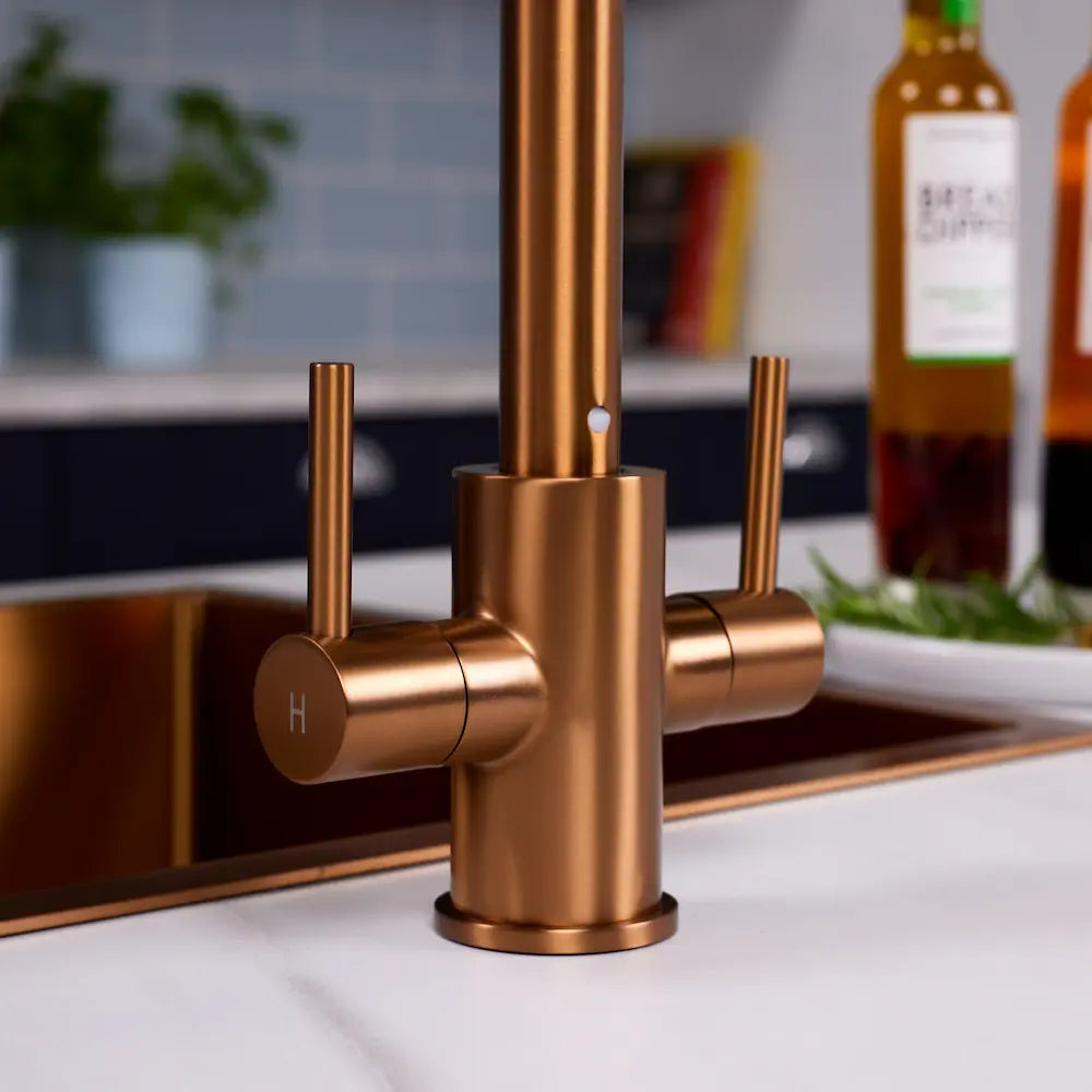 Close-up of the hot lever on the Adria brushed copper kitchen tap
