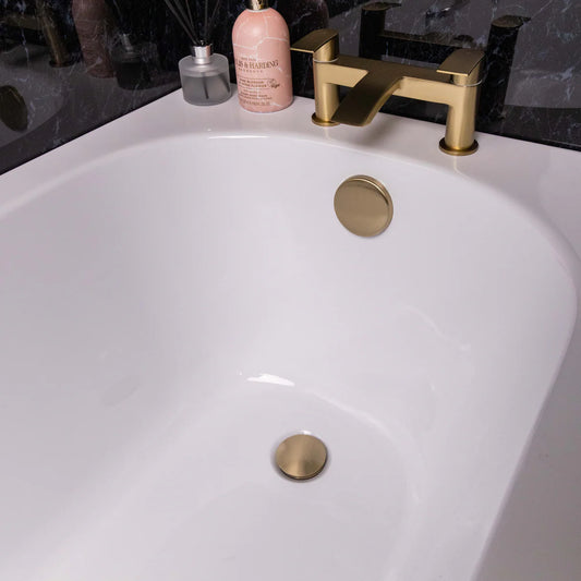 Brushed brass bath waste with overflow fitted in bath at Irishbath store Ireland