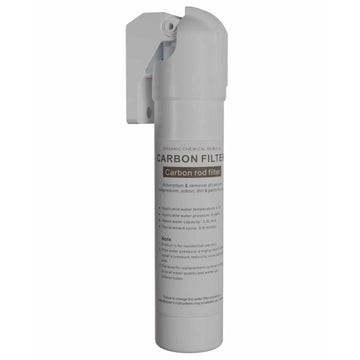 The inline carbon water filter assembled on its wall bracket, showing the quarter-turn head and the cartridge label reading Carbon Rod Filter