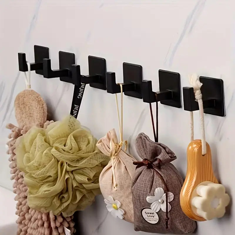 Set of six matt black adhesive hooks for home organisation – many items hanged on tile wall at IrishBath