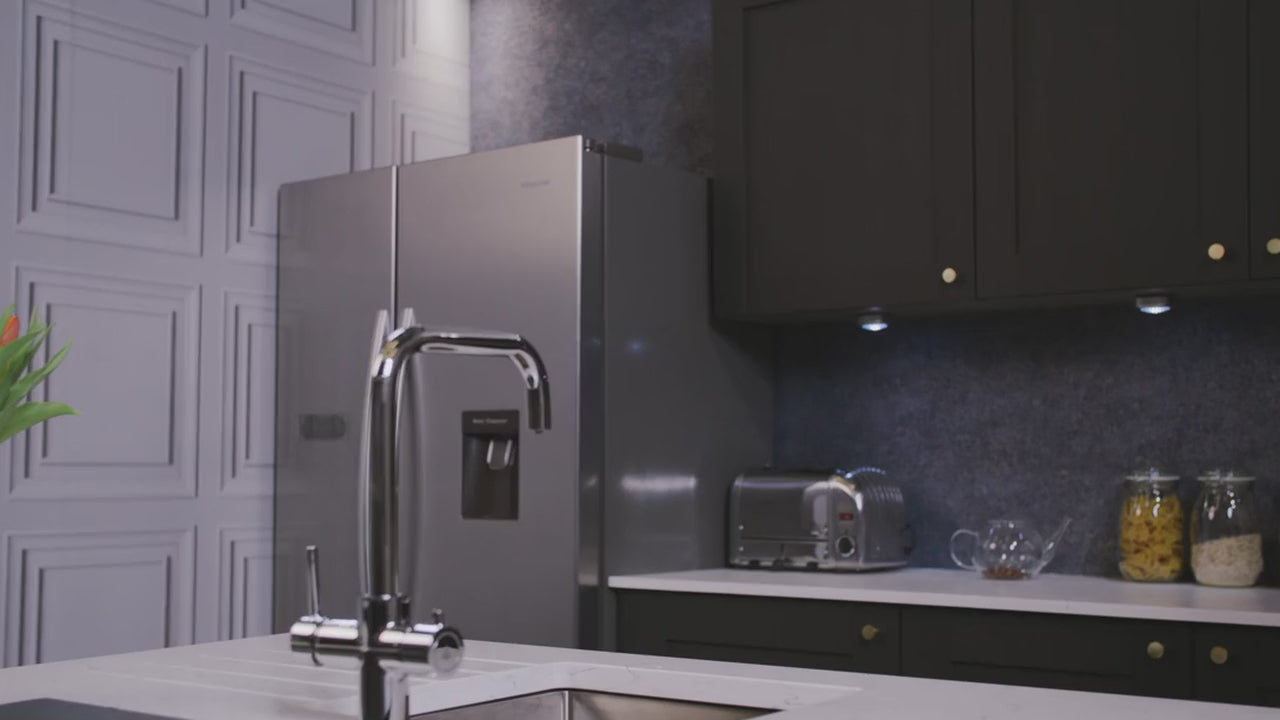 Video demonstration of the 3 in 1 instant boiling water tap: the separate boiling lever being pressed and filtered boiling water filling a mug