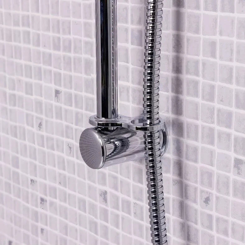 Chrome shower head and hose against a tiled bathroom wall