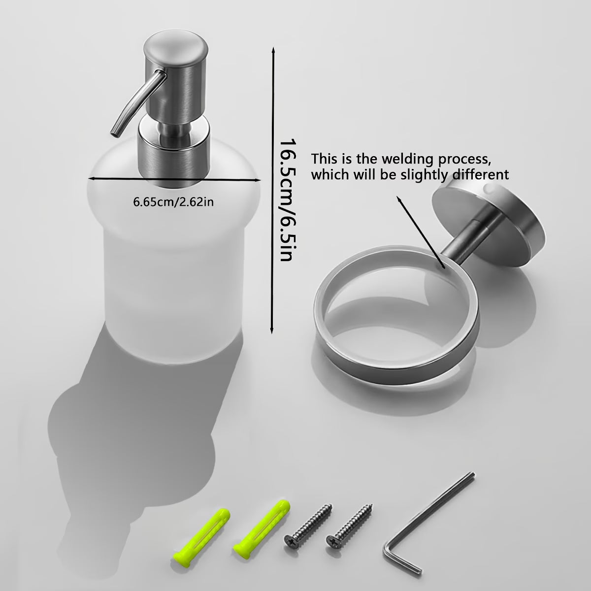 Dimensions and fixings for the wall mounted soap dispenser: 16.5 cm tall, 6.65 cm bottle diameter, supplied with two screws, two wall plugs and a hex key.